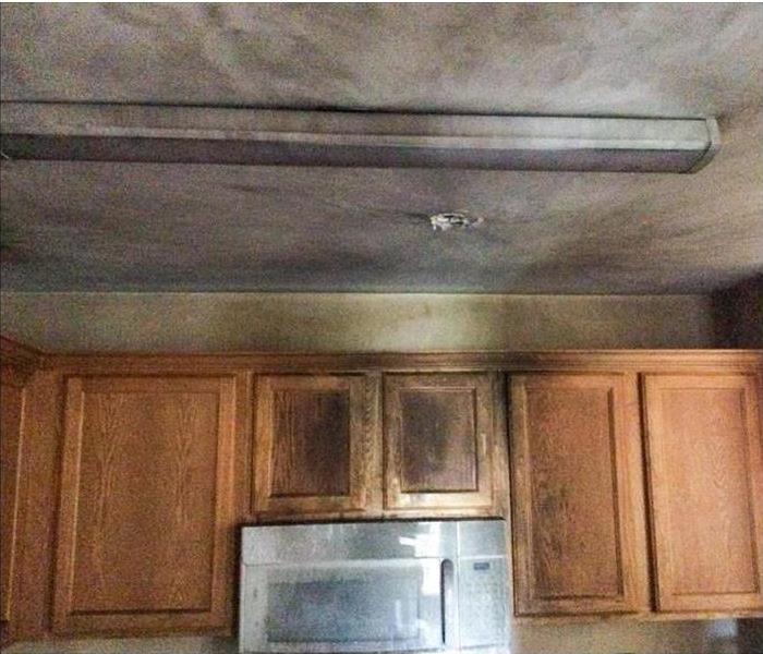 Smoke on ceiling and kitchen cabinets