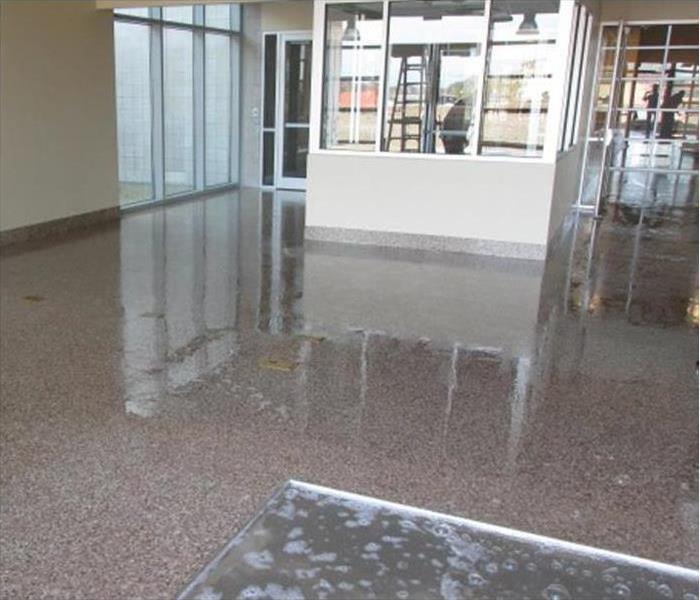 Stormwater inside the lobby of a commercial building